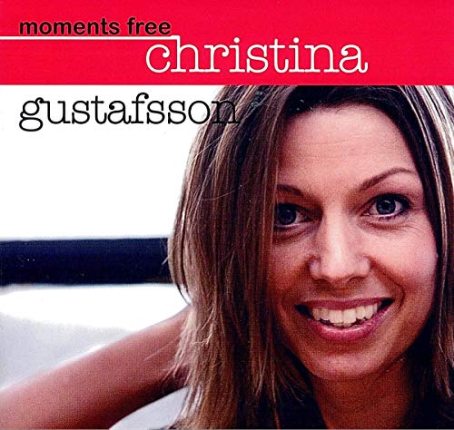CD cover featuring a smiling woman with brown hair, red background.