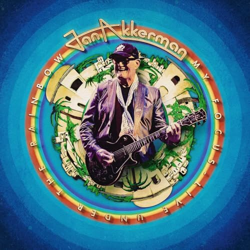 Jan Akkerman with guitar, album cover with rainbow and city imagery.