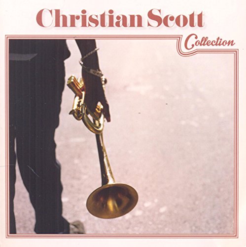 CD cover: Christian Scott holding a golden trumpet against a pink background.