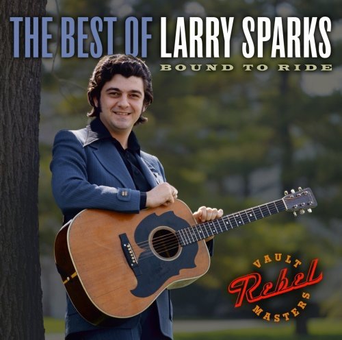 Larry Sparks album cover: man with acoustic guitar, blue suit.