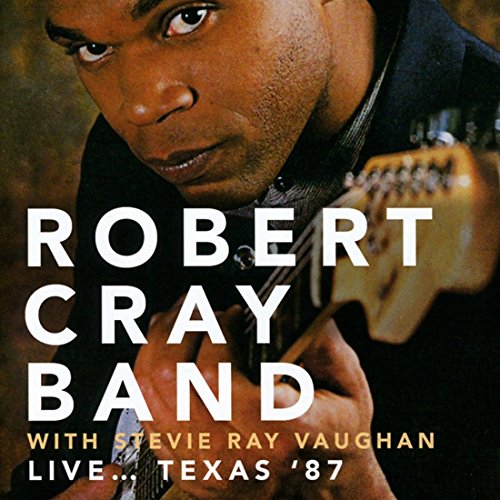 Robert Cray with Stevie Ray Vaughan album cover, close-up portrait.