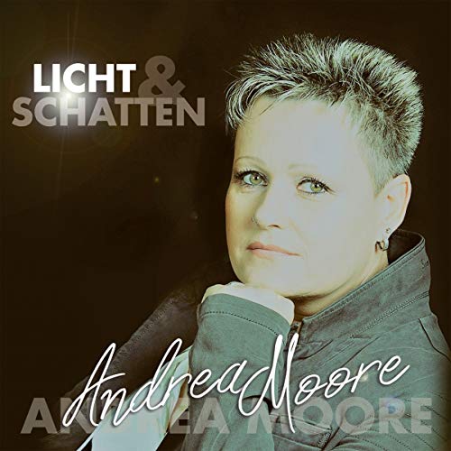 CD cover featuring portrait of Andrea Moore with short hair.