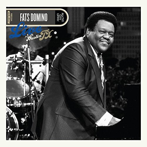 Fats Domino album cover, black and white portrait at a piano.