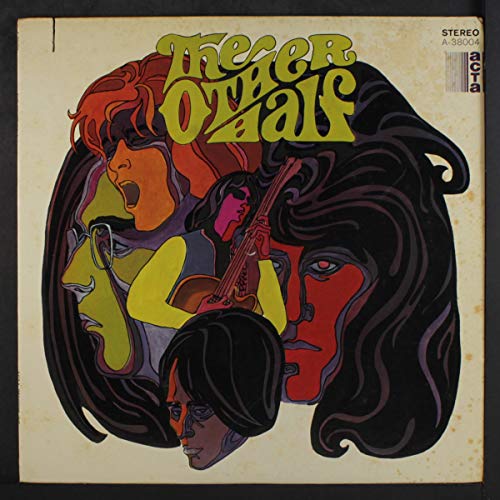 Psychedelic album cover featuring multiple faces and a violin.