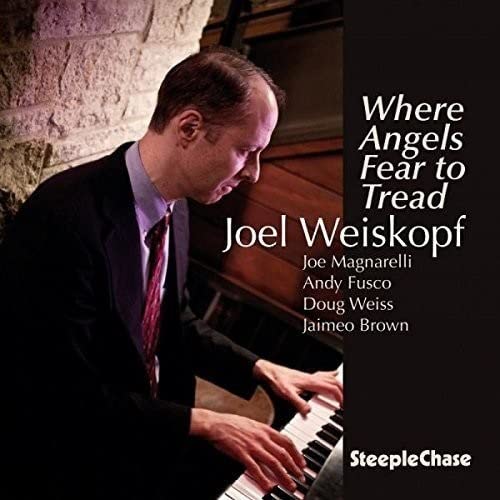 CD cover featuring jazz pianist Joel Weiskopf playing the piano.