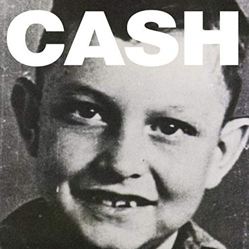 Black and white portrait of young Johnny Cash with bold "CASH" text.