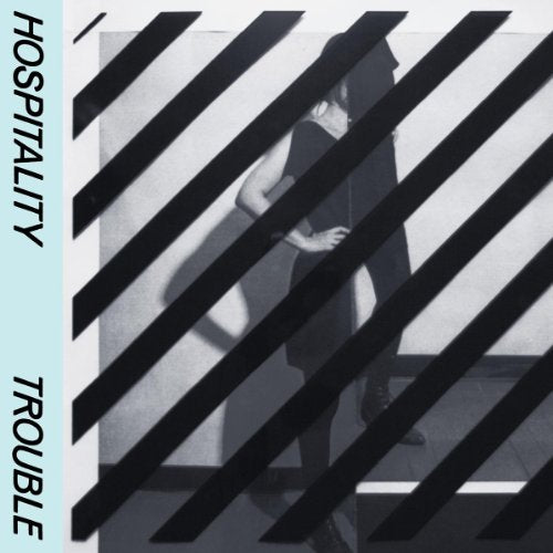 CD cover for Hospitality’s “Trouble” featuring a shadowed couple and bold lines.