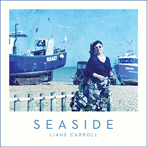 Liane Carroll album cover with a woman by fishing boats on a beach.