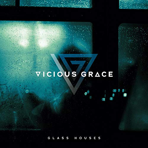 CD cover for "Glass Houses" featuring a teal triangle and rain-streaked glass.