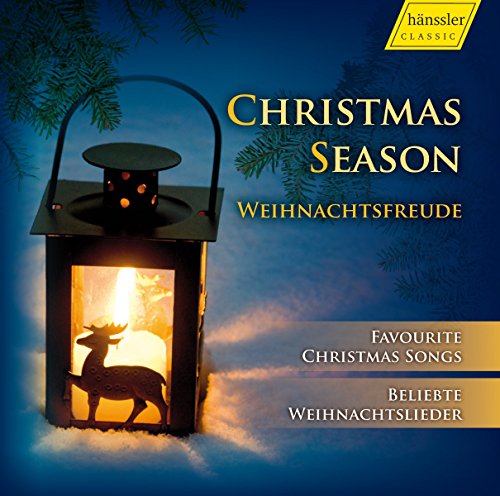 CD cover for "Christmas Season" featuring a lantern and reindeer silhouette.