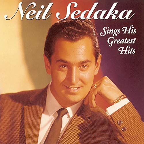 CD cover featuring portrait of singer Neil Sedaka in a suit.