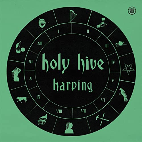 Vinyl record cover: dark green circle with zodiac-like symbols and text.