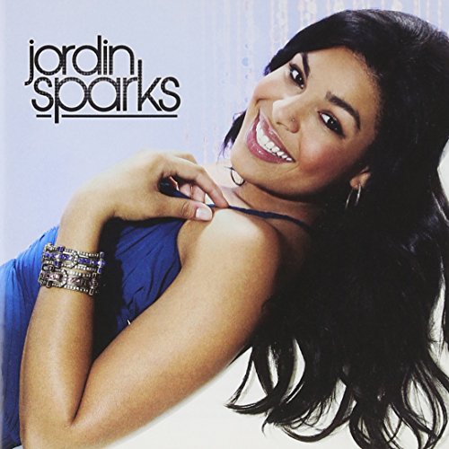 Jordin Sparks album cover featuring a smiling woman with long dark hair.