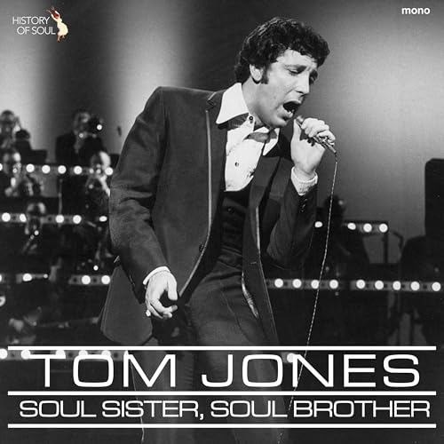 Tom Jones singing into a microphone on a vinyl record cover.