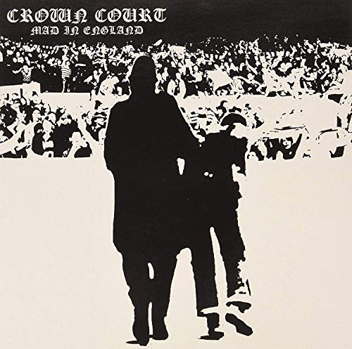 Black and white vinyl record cover with silhouetted figures in a crowd.