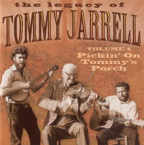 CD cover featuring three musicians with banjo, fiddle, and guitar.