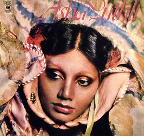 Record album cover featuring a close-up portrait of Asha Puthli.