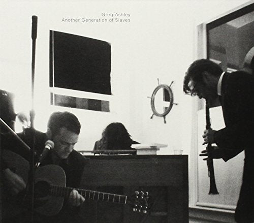 Black and white album cover featuring musicians with instruments indoors.