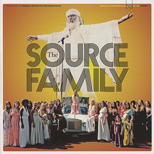 Album cover featuring a large bearded man in white robes above a group.
