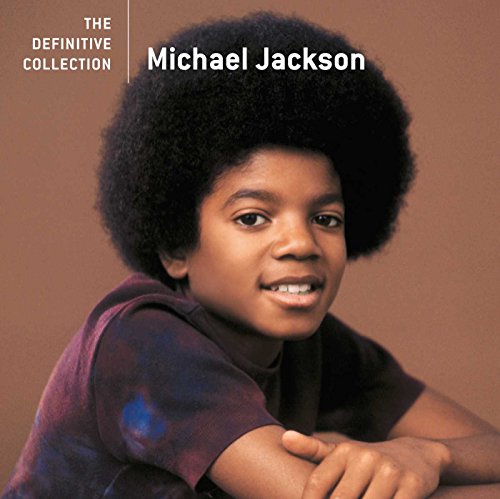 Young Michael Jackson portrait on album cover, brown background.