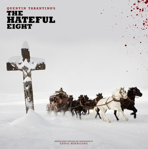 Snowy landscape with horse-drawn carriages and a prominent wooden cross.