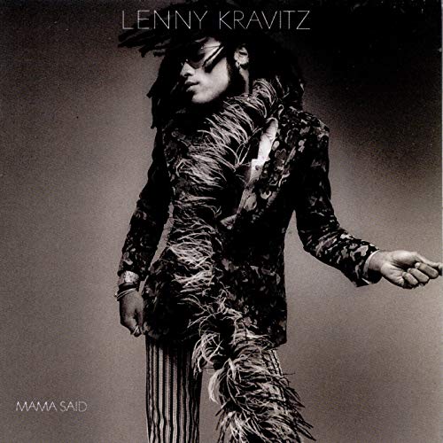 Black and white album cover featuring Lenny Kravitz wearing a feather boa and sunglasses.