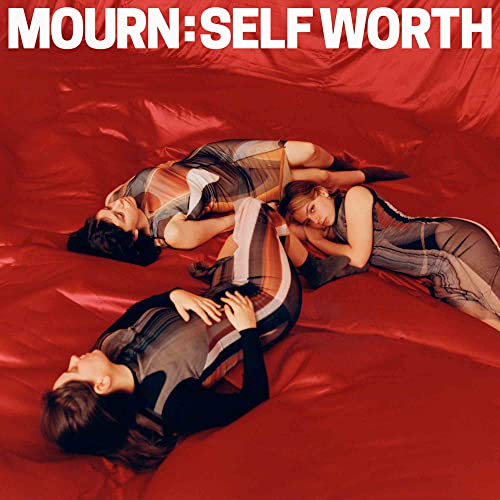 Three people lying on red fabric, album cover for MOURN’s “SELF WORTH”.