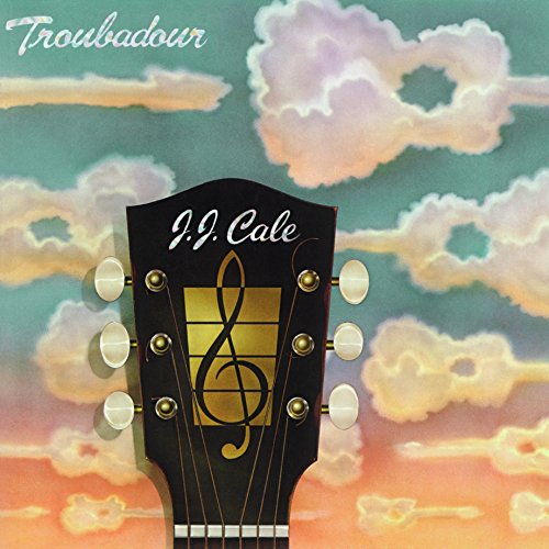 J.J. Cale Troubadour album cover featuring a guitar headstock against a cloudy sunset background.