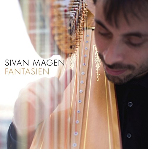 Close-up of a man playing a large harp, album cover for "Fantasien".