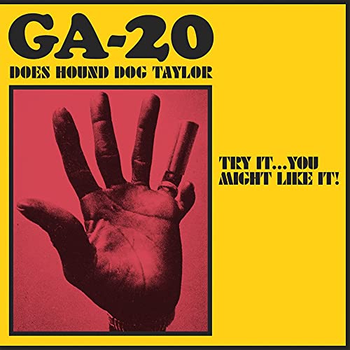 GA-20 album cover: yellow background, red frame, hand with text.