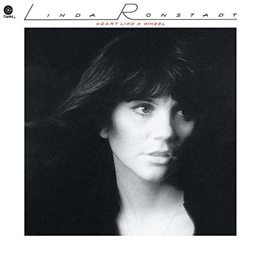 Black and white portrait of Linda Ronstadt on a vinyl record album cover.