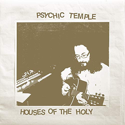 Bearded man playing acoustic guitar, sepia-toned album cover for Psychic Temple.