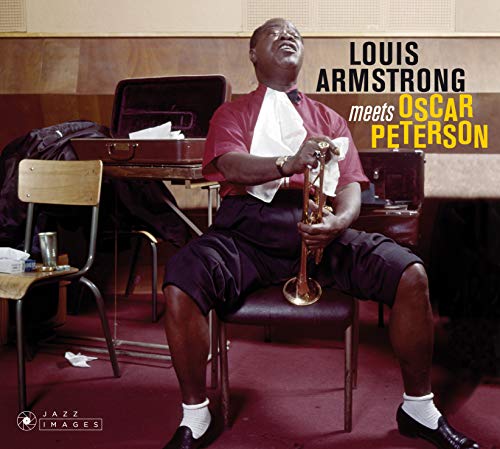 Louis Armstrong playing trumpet, album cover for “Meets Oscar Peterson.”