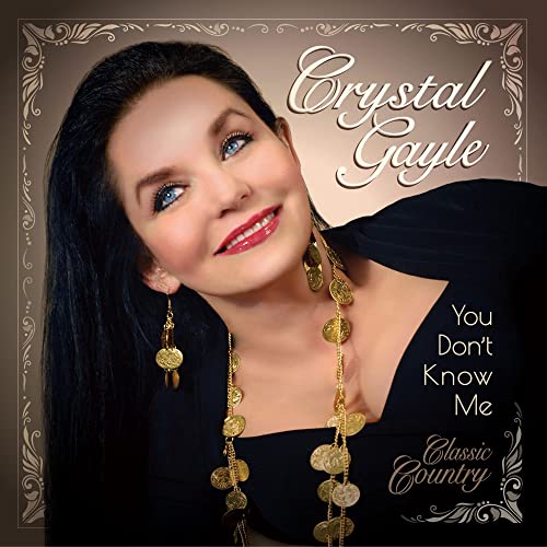 CD cover featuring Crystal Gayle with long dark hair and gold jewelry.
