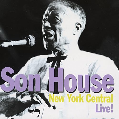 Son House performing live with a microphone, album cover image.