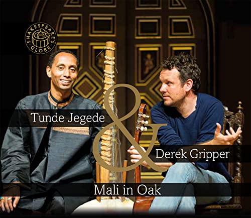 Two musicians, Tunde Jegede and Derek Gripper, with a kora instrument.