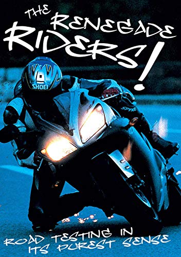 Motorcyclist in helmet riding a silver sport bike at night.