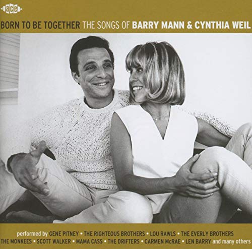 CD cover featuring a smiling couple and song credits in gold text.