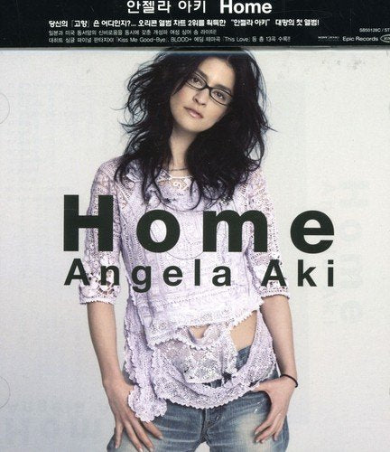 CD cover for "Home" by Angela Aki, featuring a woman with glasses.