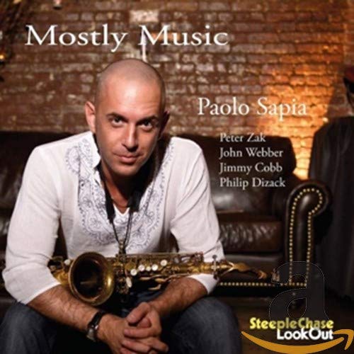 CD cover: Paolo Sapia with saxophone, brick wall background.