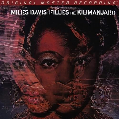 Album cover for Miles Davis’ “Filles De Kilimanjaro” featuring a woman’s face.