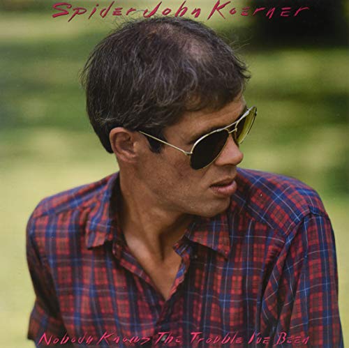 Album cover featuring John Koerner in sunglasses and a plaid shirt.