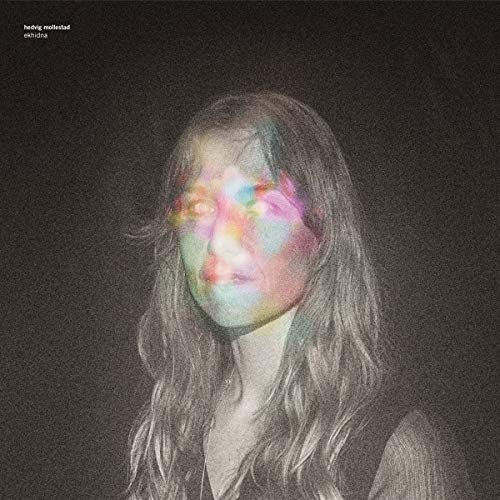 CD cover for Hedvig Mollestad’s “Ekhidna” featuring a blurred, colorful portrait.