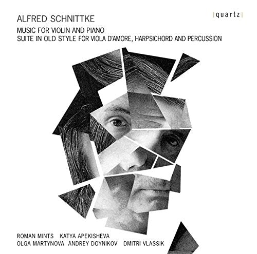 CD cover featuring a fragmented portrait of a person’s face in grayscale.