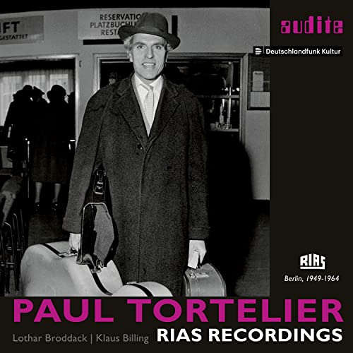 Black and white photo of cellist Paul Tortelier with his instrument.