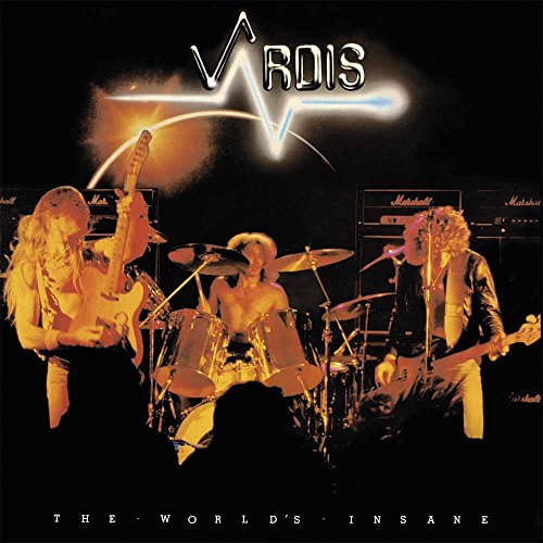 1980s rock band Vardis performing onstage with instruments and amplifiers.
