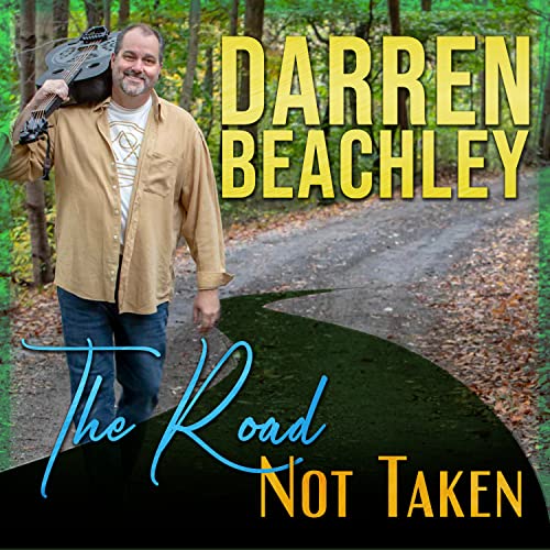 CD cover featuring musician Darren Beachley on a woodland path.