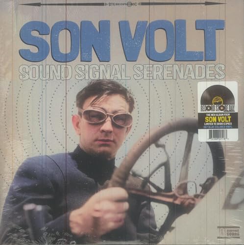 Son Volt album cover featuring a man with glasses and a steering wheel.