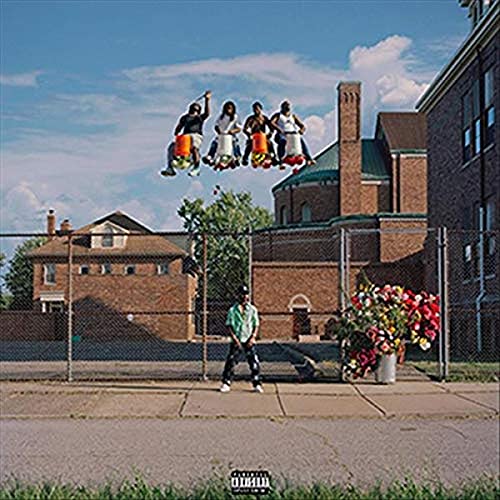 Album cover for Big Sean’s “Detroit 2” featuring people on a carnival ride.