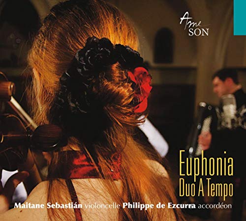 CD cover: cellist with flowers in hair, accordionist blurred in background.